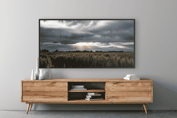 metal print with decorative frame with a wheat field at sunset