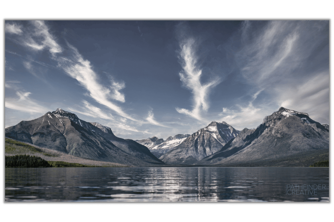 Mountains at Lake McDonald glacier national park with white clouds