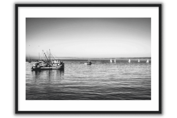 decorative print of a fishing boat in the harbor black and white