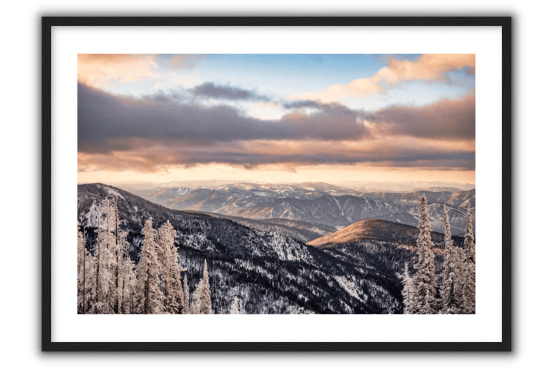 bright colors and a sunrise with snow in the mountains