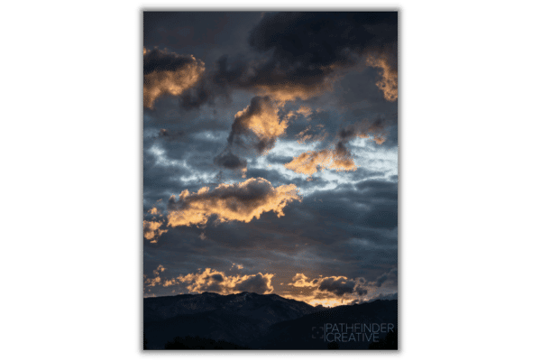 clouds at sunset over dark mountains, metal print